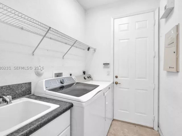 5-bedroom home for sale in West Palm Beach - 9345 Madewood Ct - MondialRealty