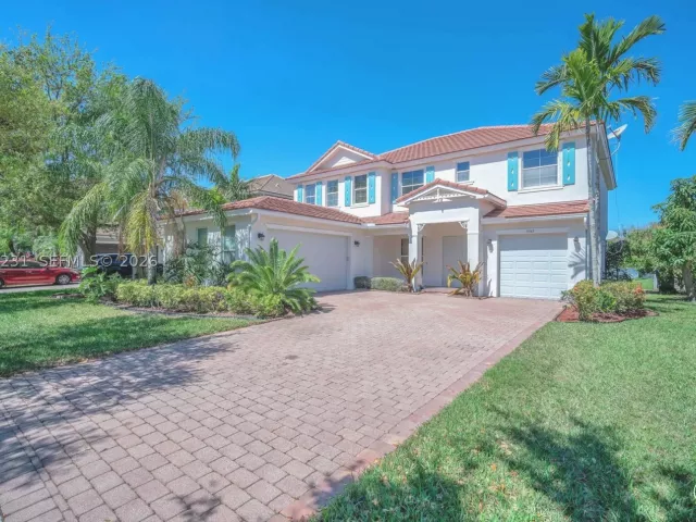 5-bedroom home for sale in West Palm Beach - 9345 Madewood Ct - MondialRealty