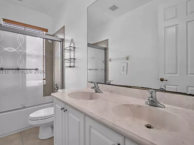 5-bedroom home for sale in West Palm Beach - 9345 Madewood Ct - MondialRealty