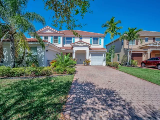 5-bedroom home for sale in West Palm Beach - 9345 Madewood Ct - MondialRealty