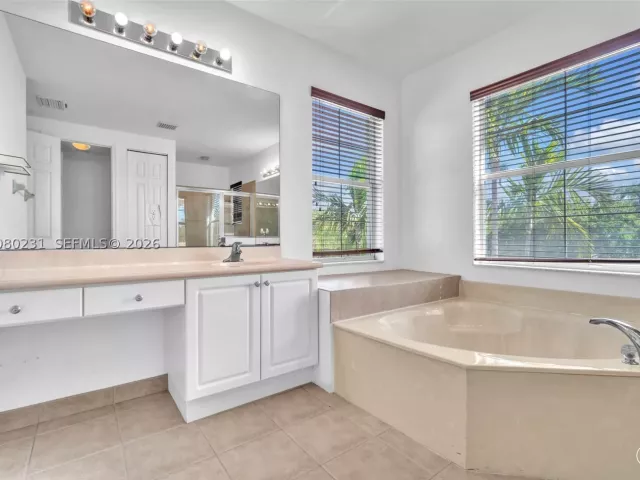5-bedroom home for sale in West Palm Beach - 9345 Madewood Ct - MondialRealty