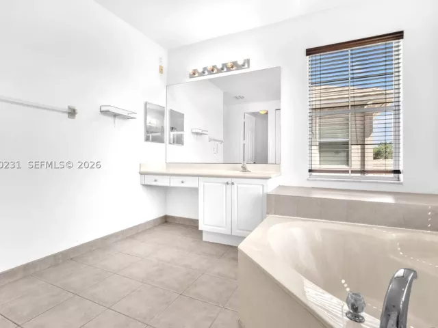 5-bedroom home for sale in West Palm Beach - 9345 Madewood Ct - MondialRealty