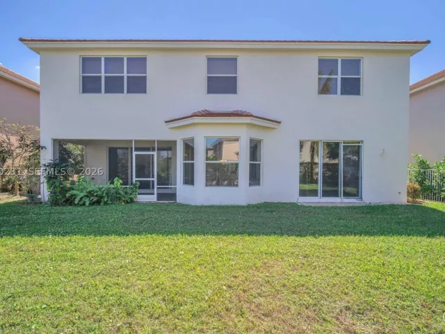 5-bedroom home for sale in West Palm Beach - 9345 Madewood Ct - MondialRealty
