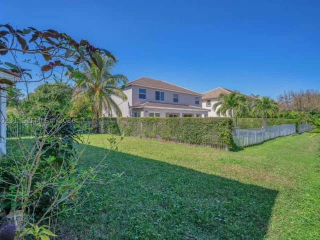 5-bedroom home for sale in West Palm Beach - 9345 Madewood Ct - MondialRealty