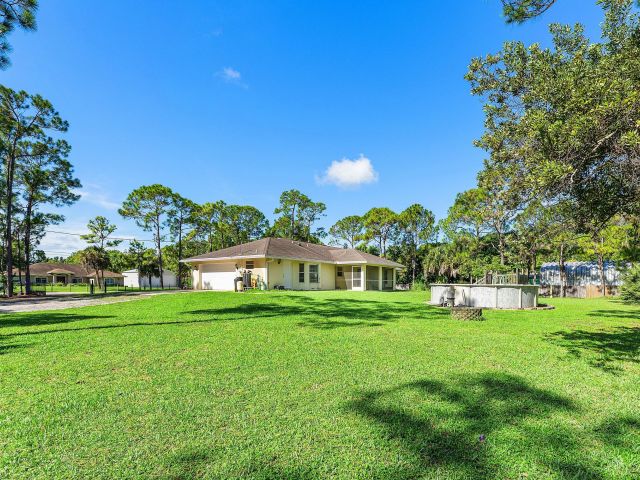 3-bedroom home for sale in West Palm Beach - 12315 66th Street N - MondialRealty